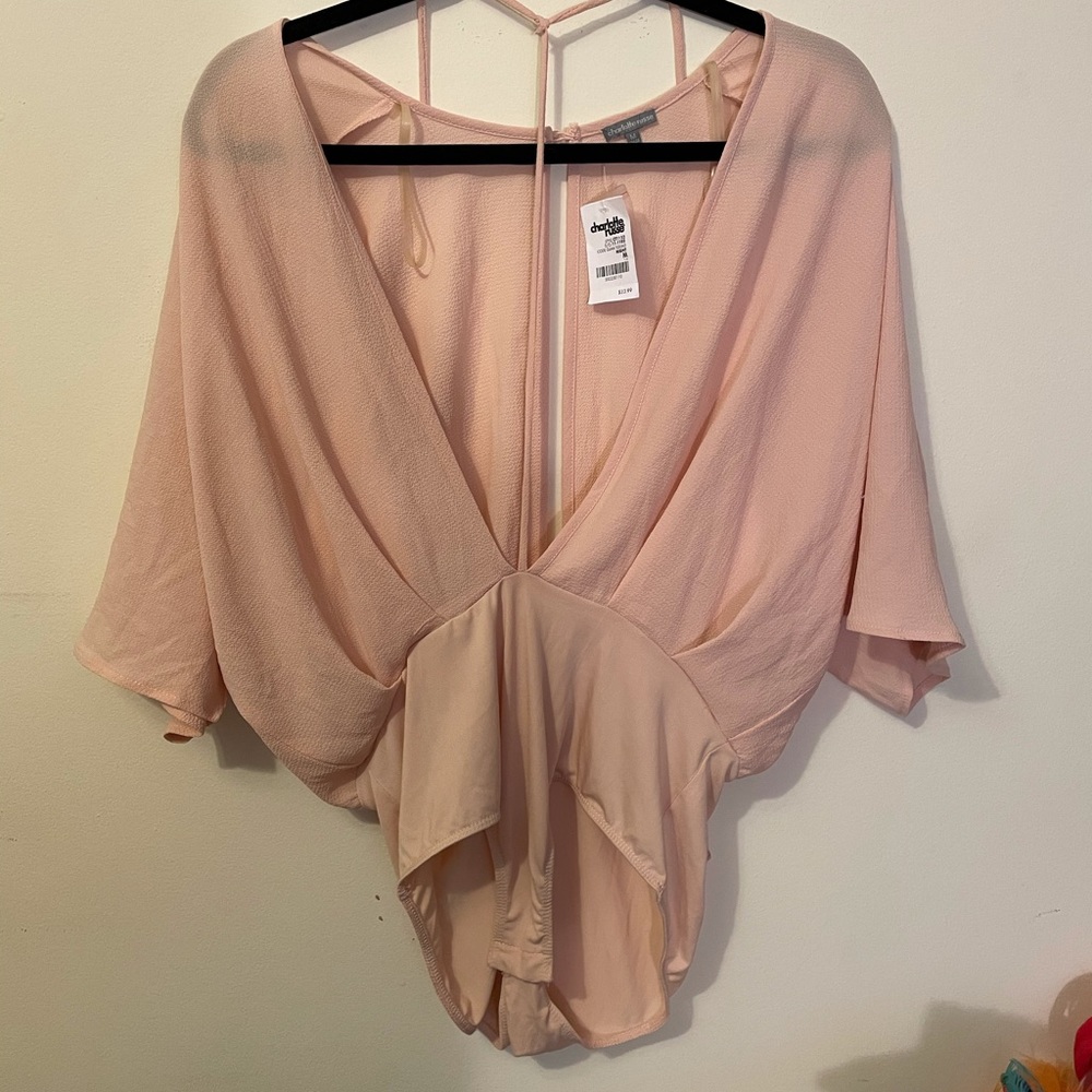 Light pink body suit
